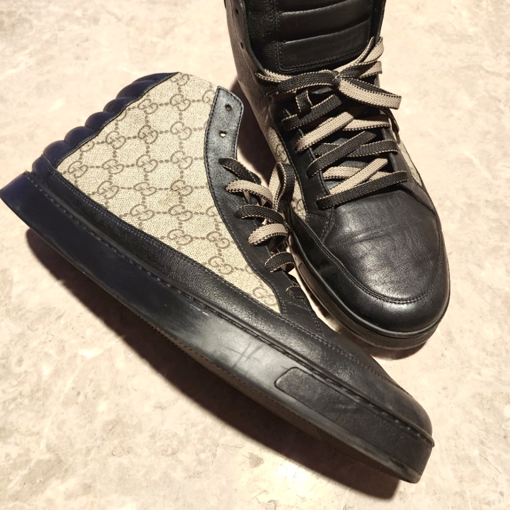 Gucci hi top casual shoe black and tan they are size 17 because gucci run small